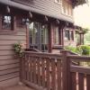 Closeup of entry to breakfast room shows restored exterior details.