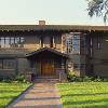 Bolton House as it appeared in 1982 with our new color scheme. Since house was built in 1906 both ends were expanded, living room terrace was enclosed, and a large bay was added, requiring  porch eaves to be clipped.