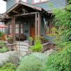 Covered porch opens to a pergola above windows.  As in the bungalow era, we embellished entry with extra detail and care.